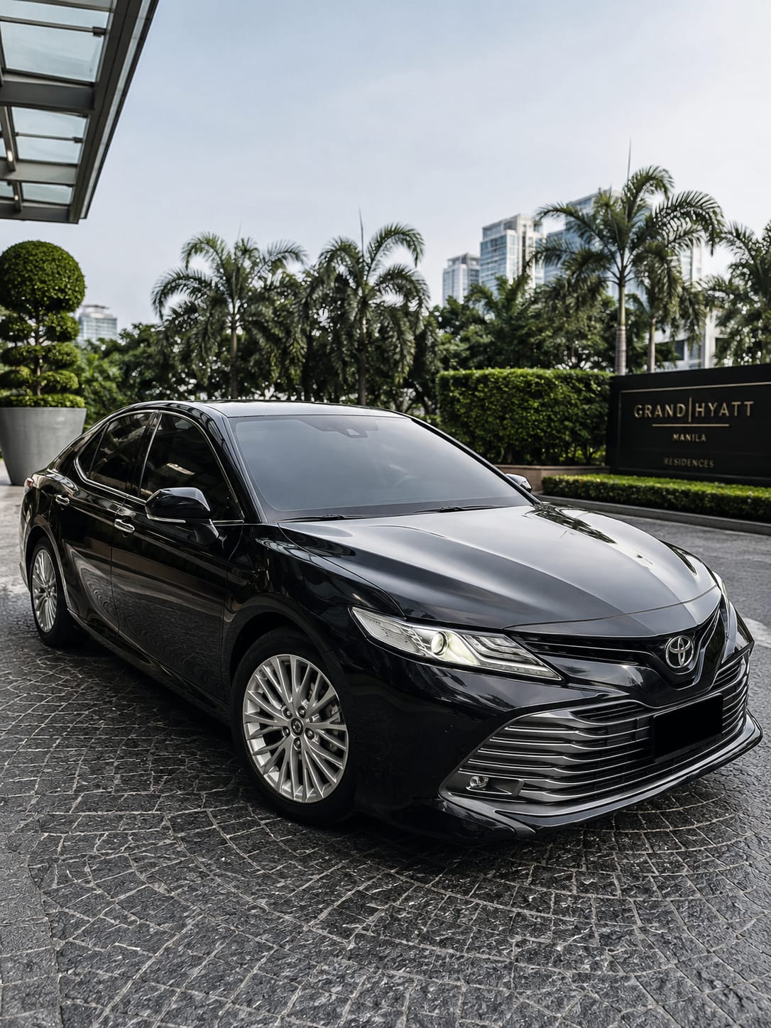 Toyota Camry premium sedan available for self-drive and chauffeur car rental in the Philippines.